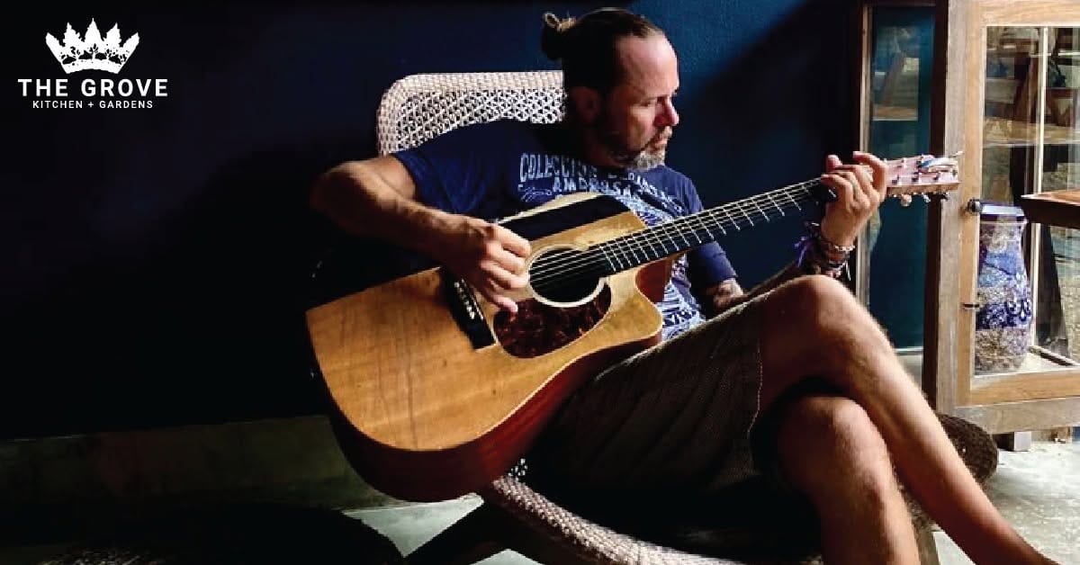 John Curry live music artist featured at The Grove Kitchen & Gardens in Tyler, Texas
